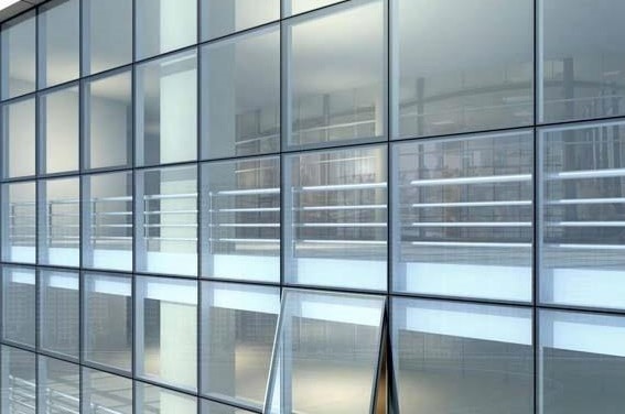 واجهات كرتن وول (Curtain Wall Systems)